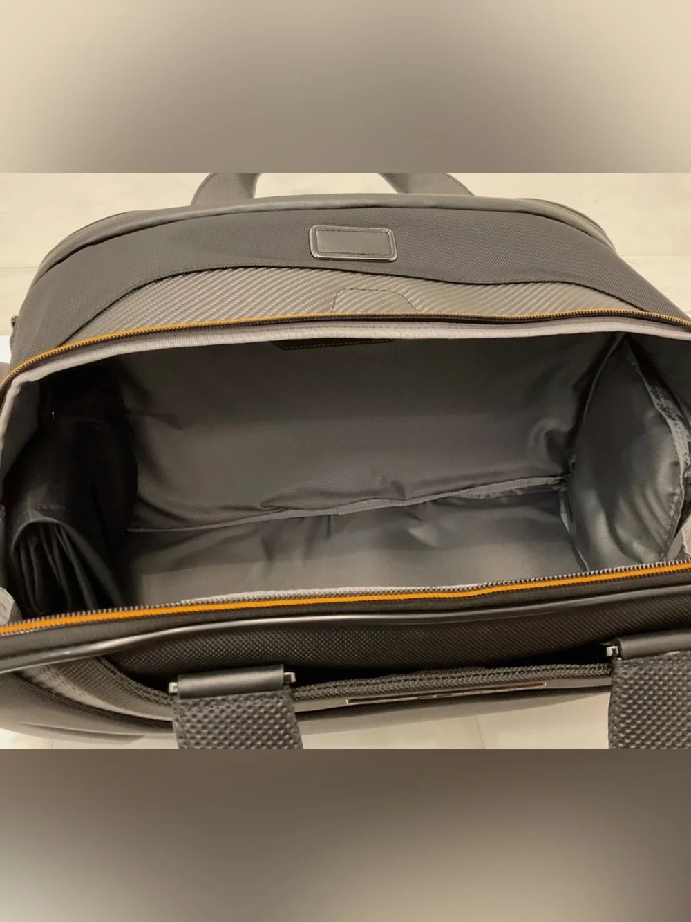 NEW Tumi McLaren QUANTUM 21.5” Duffel Bag - BLACK with PAPAYA ORANGE Accents